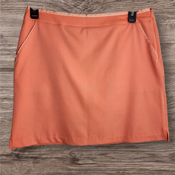 Greg Norman NWT peach colored golf skort skirt with shorts woman's size 10 - Picture 1 of 10